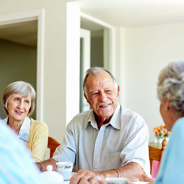 Senior couple talking on the dining table